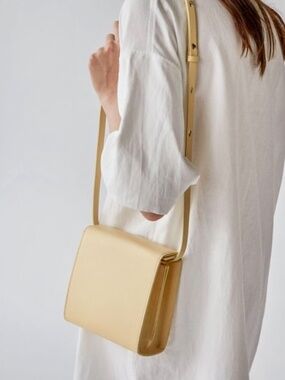 Aesther Ekme Square Pouch Shoulder and Wrist Bag Butter Yellow